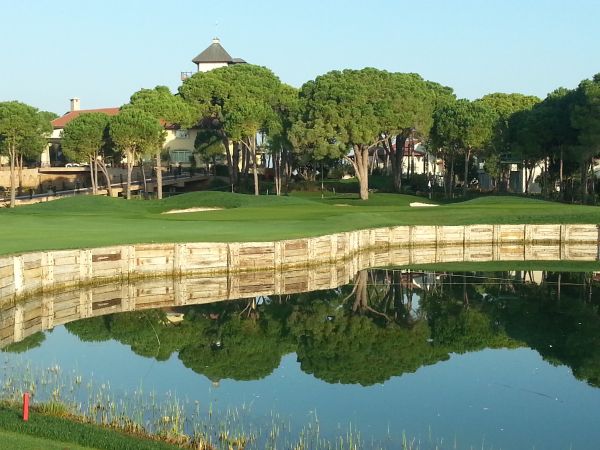9th green and clubhouse in background