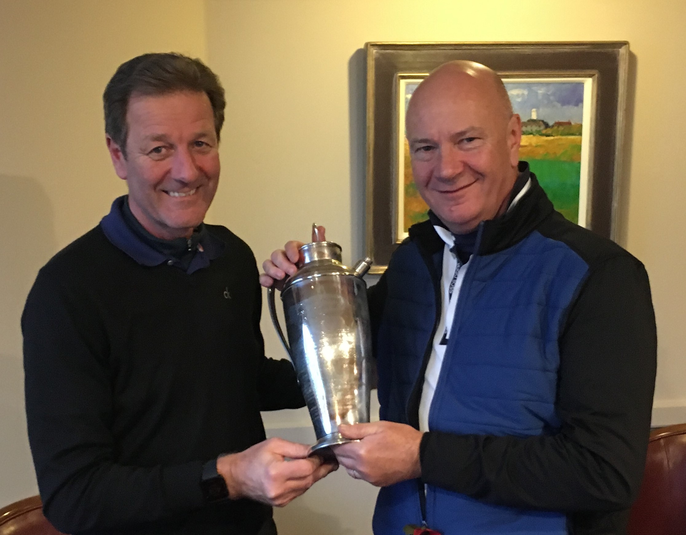 AGW Golf Captain, Peter Dixon presents Rob Perkins with the Fred Pignon Trophy. (Photo - Thank you to David Canon)