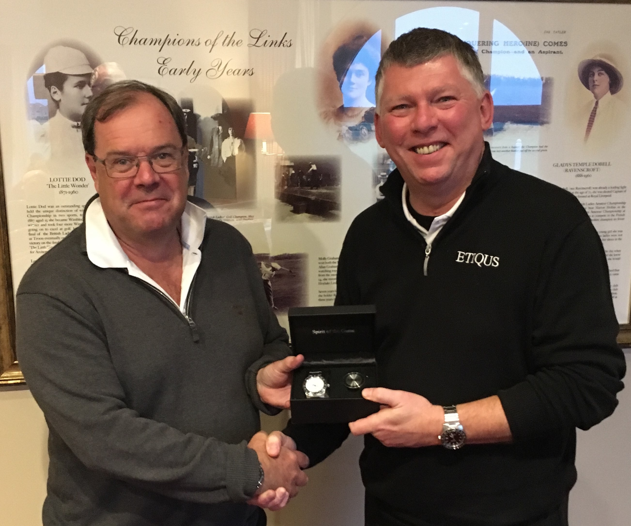 ETIQUS Gary Butler hands Colin Callander his reward in winning the AGW - ETIQUS AGW Golfer of the Year. (Photo - Thank you to David Canon)