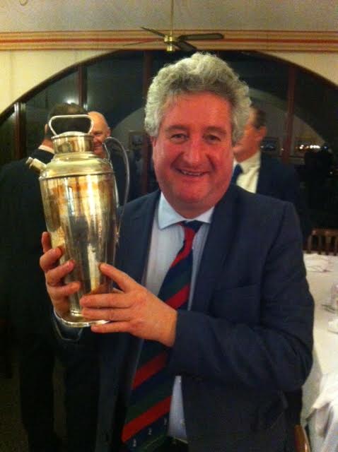 Colin Harding proudly holds aloft the Fred Pignon trophy/