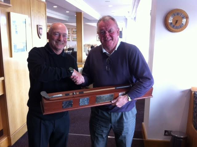 Dick Turner winner of the Presidents’ Putter and being congratulated by Hillside Chairman Jim O'Shaughnessy.
