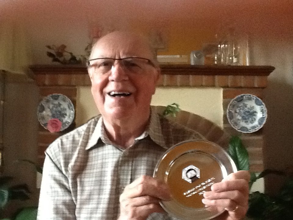 Gordon Richardson proudly holds his AGW silver tray to commemorate 50 yeards a member of the AGW