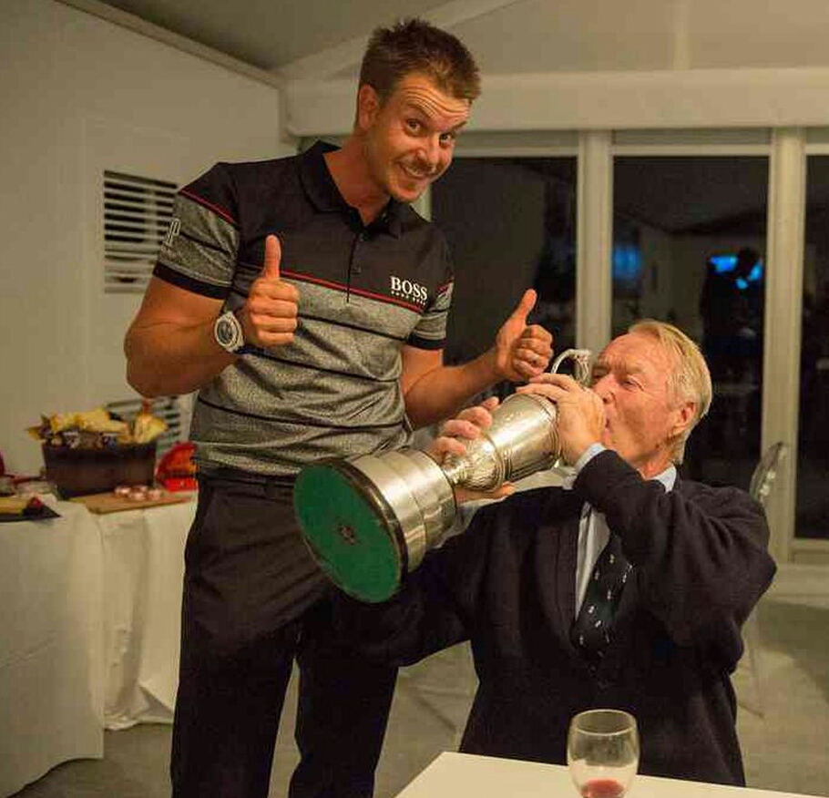 Open Champion Henrik Stenson with AGW President Goran Zachrisson drinking from Claret Jug and much to the pleasure of Stenson.